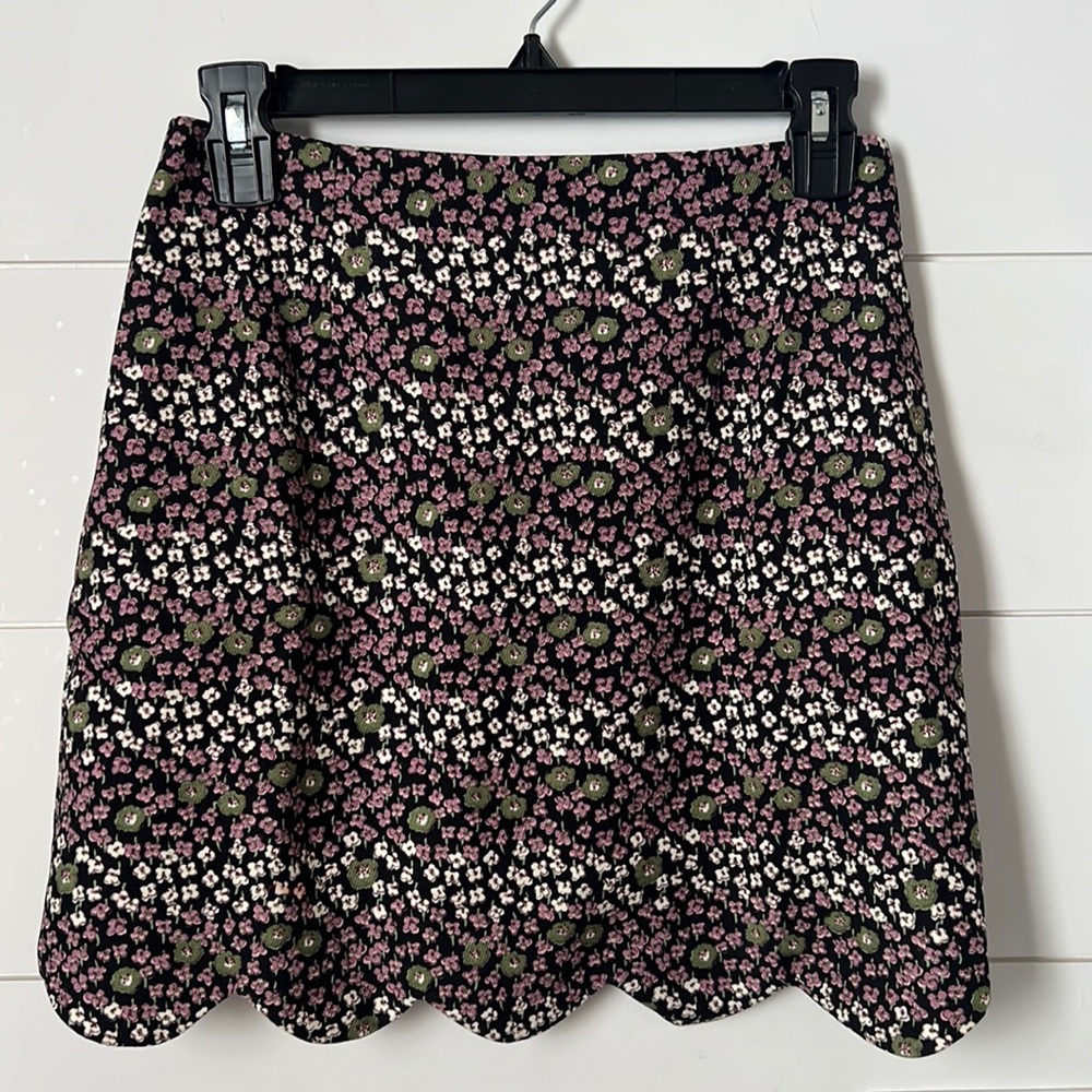 Floral mini skirt with scallop hem